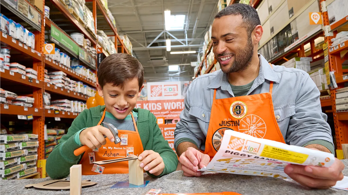Children working on projects at a Home Depot Kids Workshop